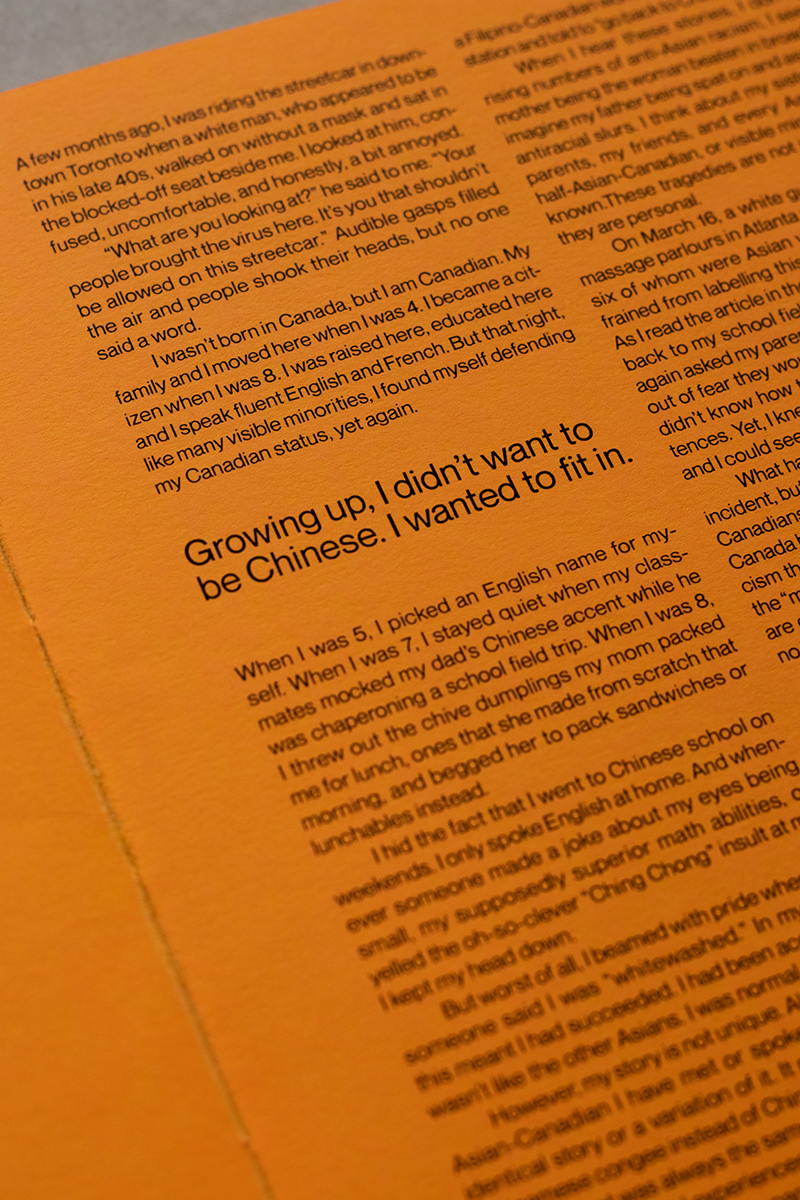 Close up picture of a page in orange, highlighting a quote.